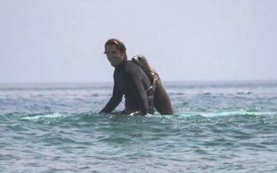Surfer Hit The Waves and Came Out Of The Ocean With An Unexpected Incredible Friend!