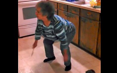 Video: Granny Was Cooking Dinner When Her Favorite Song Comes On. Her Reaction Is Hilarious!