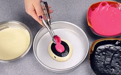 This Lady Scoops A Few Different Batters Into A Bowl. When She Removes It From The Oven WOW!