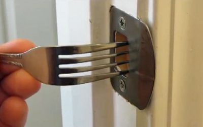 He Pushes A Fork Into The Latch Hole Of His Door. The Result Could Save You In An Emergency!