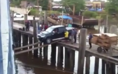 This Truck Attempts To Board A Ship By Driving Over Two Thin Wood Planks.