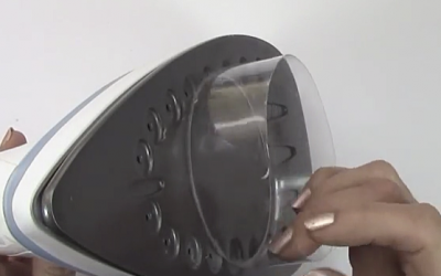 She Takes A Two Liter Plastic Bottle and Melts It On An Iron. The Final Result Is Beautiful!
