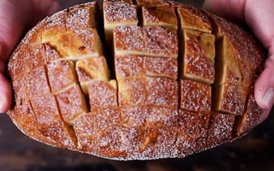 Woman Cuts This Bread Into A Bunch Of Little Squares. When She’s Done YUM!