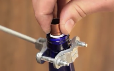 He Takes A Used Beer Bottle And 8 Bucks Worth Of Supplies. The Result I Need THIS For My Backyard!