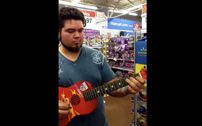 This Man Found A Toy Guitar In Walmart. The Song He Plays With It Blew Me Away!