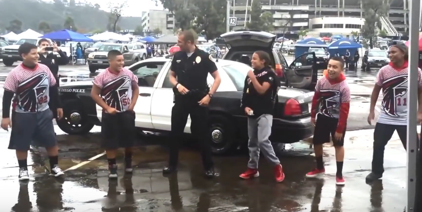 a san diego cop dances with kids watch me whip nae nae song
