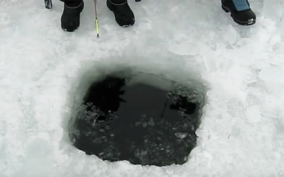 He Heard Weird Noises Coming From Their Ice Fishing Hole. Then An Unexpected Surprise Pops Out!