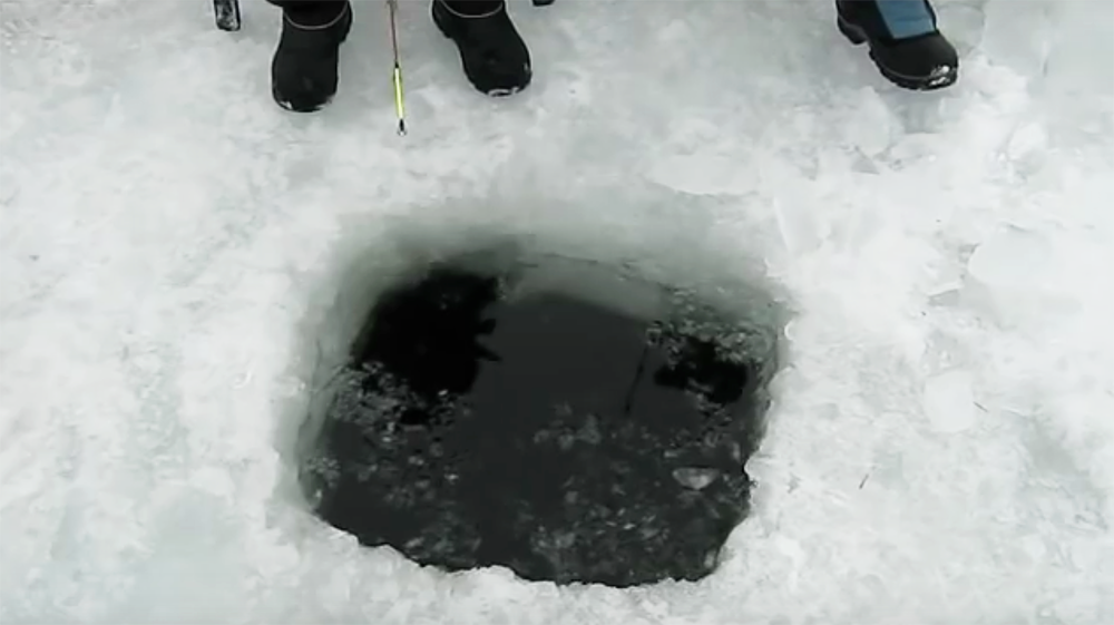 He Heard Weird Noises Coming From Their Ice Fishing Hole. Then An