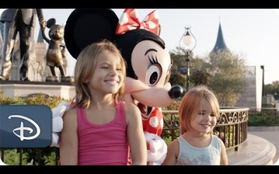 These 2 Sisters Pose For A Photo With Minnie Mouse.