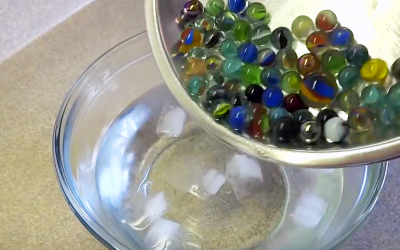 She Pours Marbles Into a Bowl of Water Filled With Ice. But When She’s Done It’s STUNNING
