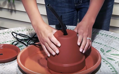 She Attaches Some Tubing To Terra Cotta Pots. But When She’s Done It’s STUNNING!