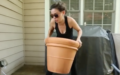 She Stacks 2 Terra Cotta Pots On Top Of Eachother. The End Result Is Priceless!