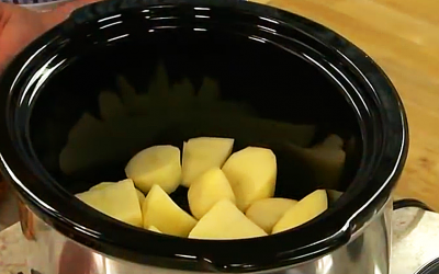 He Places Potatoes and Ketchup Into A Crock Pot. But When He’s Done YUM!