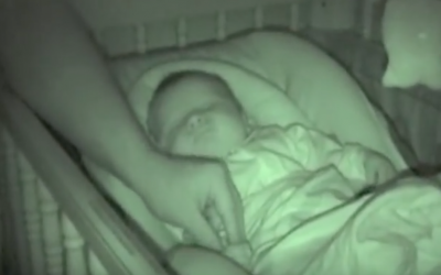 Video: Daddy Puts Newborn’s Arm Beneath The Covers. But Baby’s Other Arm Just Won’t Cooperate.