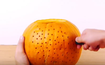 He Drills Tiny Holes All Over This Pumpkin For a Stunning New Take On The Classic Jack-O-Lantern