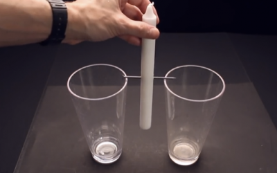He Pushes A Nail Through A Candle And Rests It On 2 Cups. When He Lights It An Unexpected Surprise!