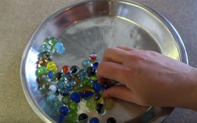 She Places A Bunch Of Marbles In A Bowl Then Bakes Them In The Oven. When She’s Done It’s STUNNING!