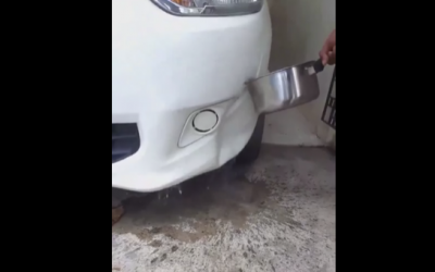 He Pours Boiling Hot Water On His Dented Bumper. Now Watch What Happens To The Dent!